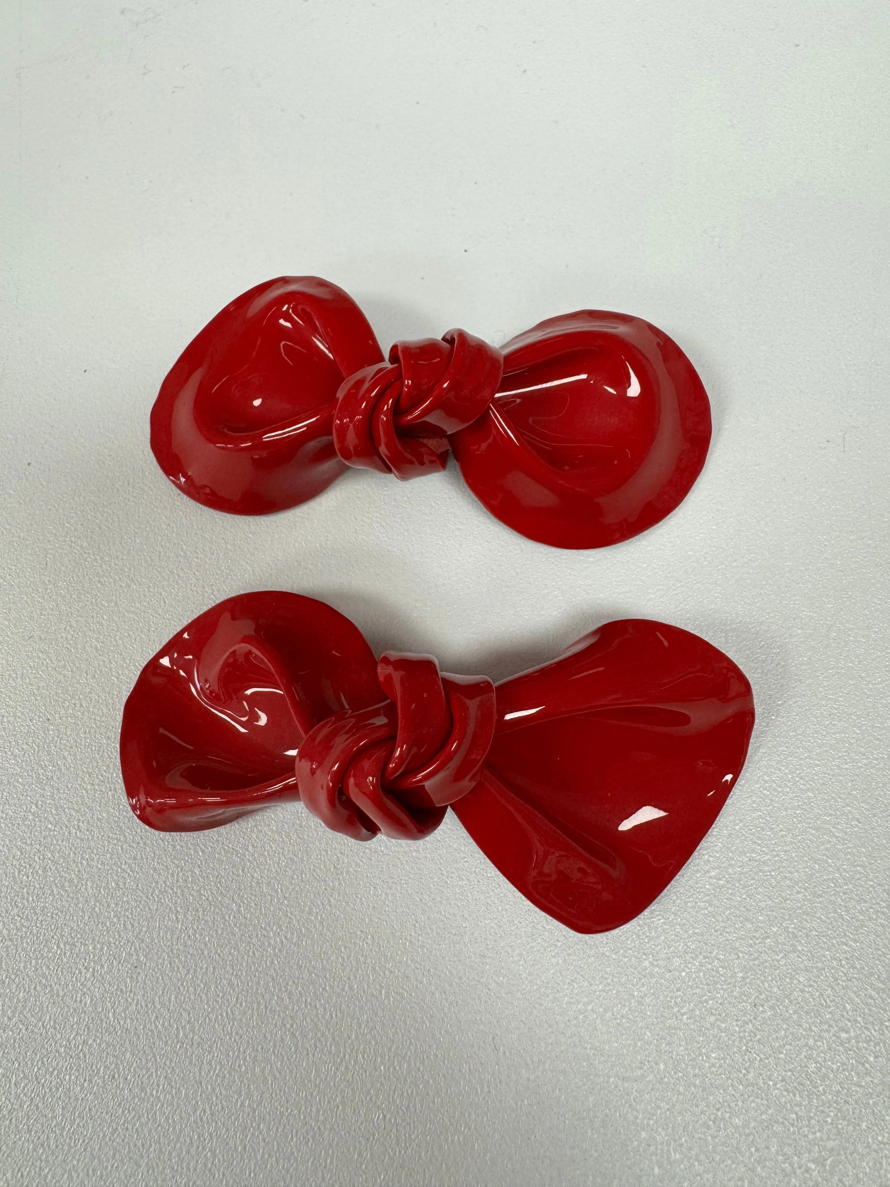 Extra Red Twist Patent Shoe Bows